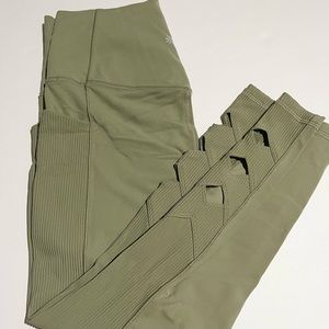 Athleta salutation stash pocket leggings with cutouts